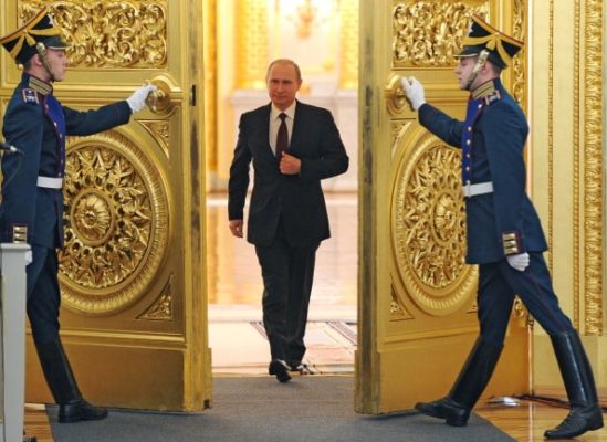 Russian President Vladimir Putin enters the St. George Hall at the Grand Kremlin Palace at the Kremlin in Moscow, on December 12, 2013, to deliver an annual state of the nation address. AFP PHOTO/ RIA-NOVOSTI/ POOL/ MIKHAIL KLIMENTYEV        (Photo credit should read MIKHAIL KLIMENTYEV/AFP/Getty Images)