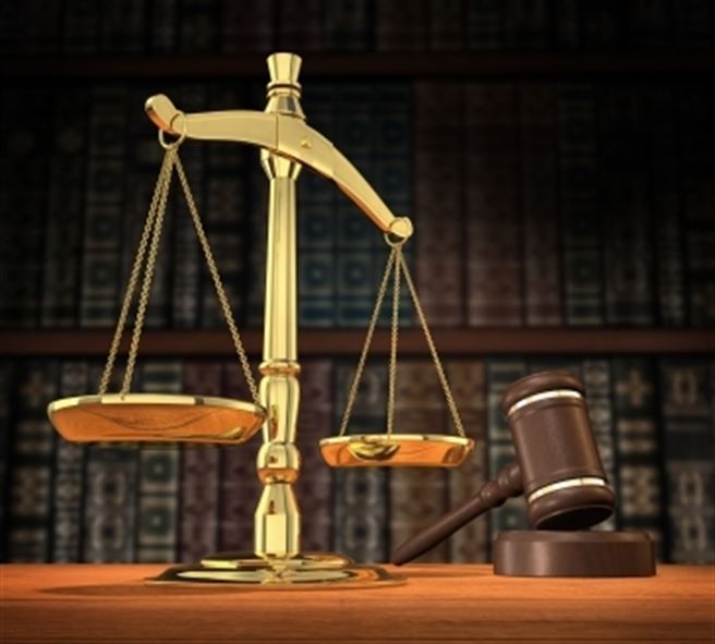 Matt Kirk lawsuit scales of justice