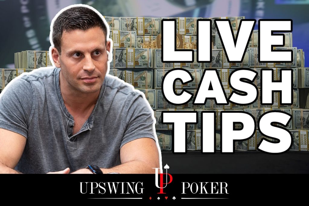 Garrett Adelstein's live cash tips banner in front of large stack of cash
